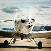 A light aircraft on a runway