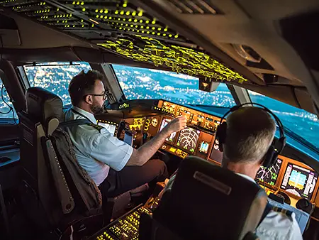 A Pilot shaking hands with a lady