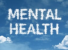 Mental health written in cloud against a blue sky