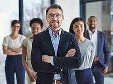 A group of professional people facing the camera