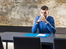 A man sitting at a desk